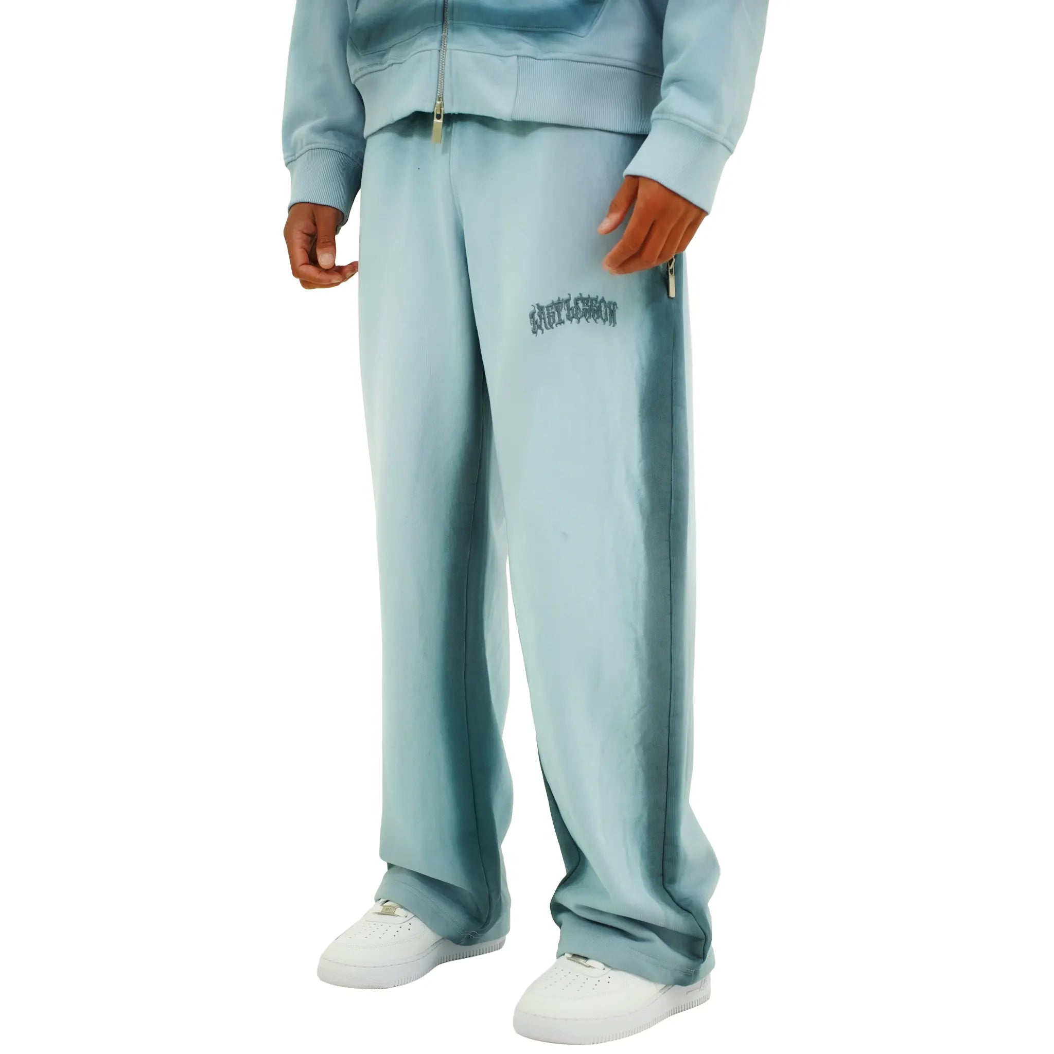 Front Side View of Last Lesson Sprayed Blue Sweatpants